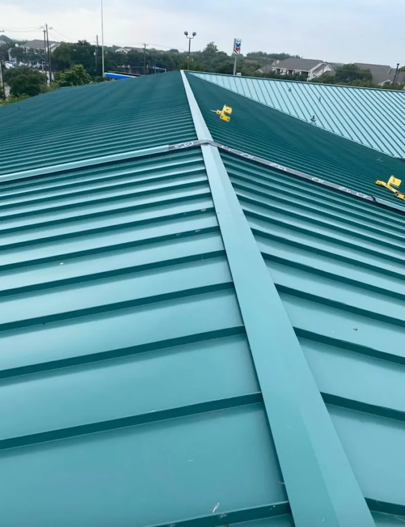 Green commercial metal roof ridge and valley for Metal Roof Repair in West Loch Estate