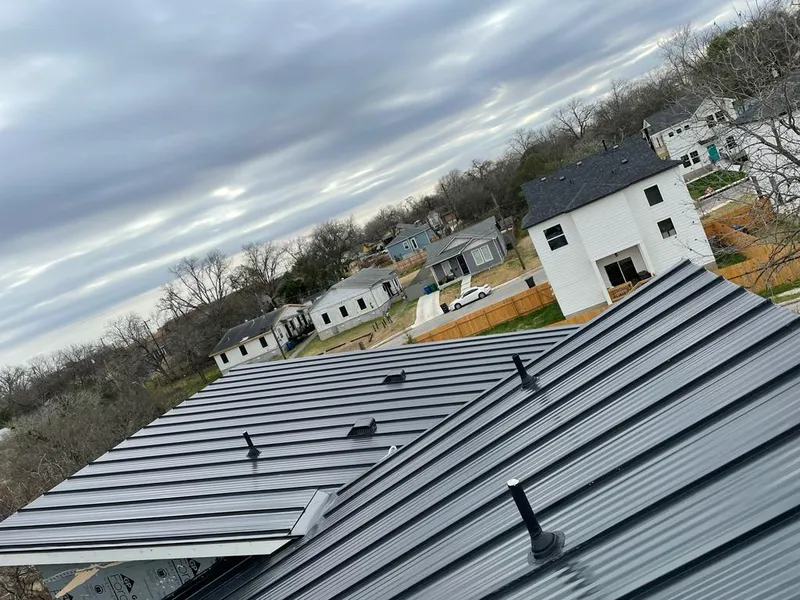 Standing seam metal roof panels with vents for Skylight Repair in West Loch Estate